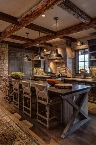 Rustic kitchen with exposed beams, stone accents, and wooden island seating eight.